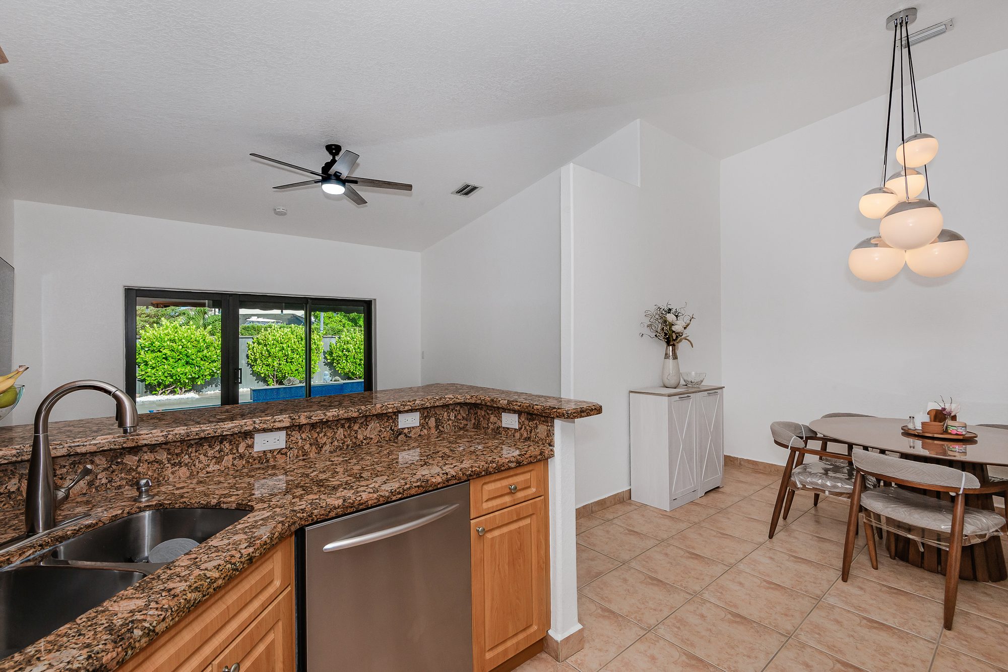 Dining area beside the granite kitchen counter