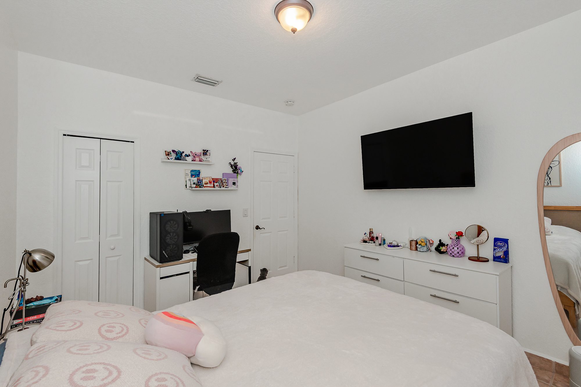 Bedroom with a flexible workspace area