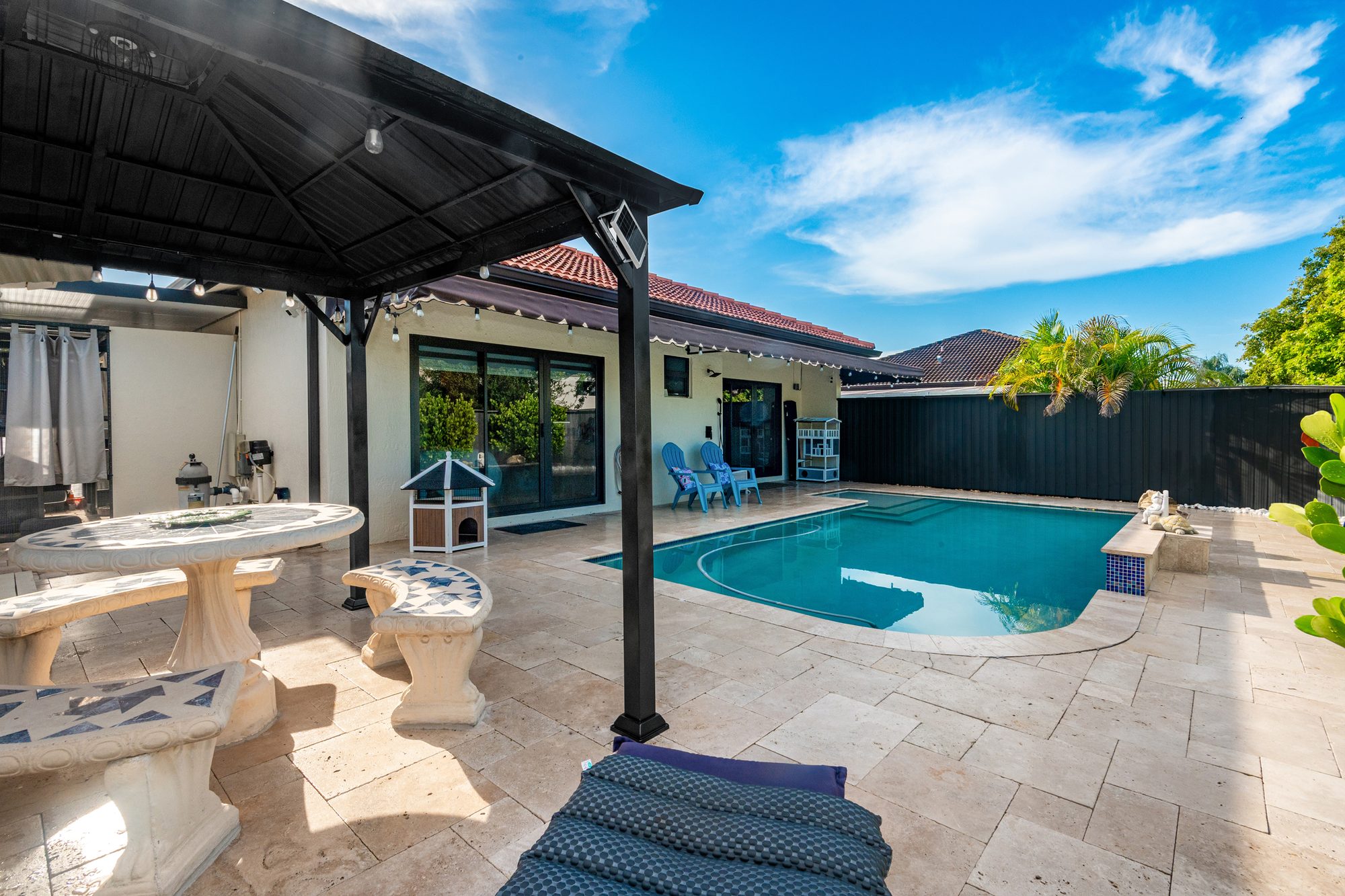 Pool with covered seating area